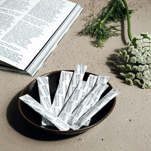 The Solution stick packs on a plate